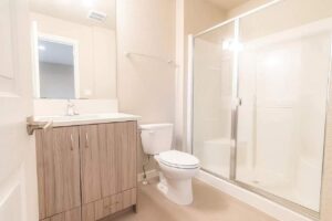 1360 NE Killingsworth St #2F Bathroom with shower room and toilet